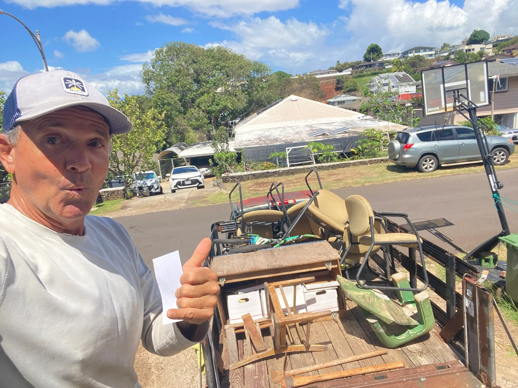 JunkForce team and company vehicle loaded with garbage